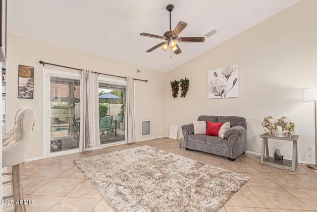 a living room with furniture and window