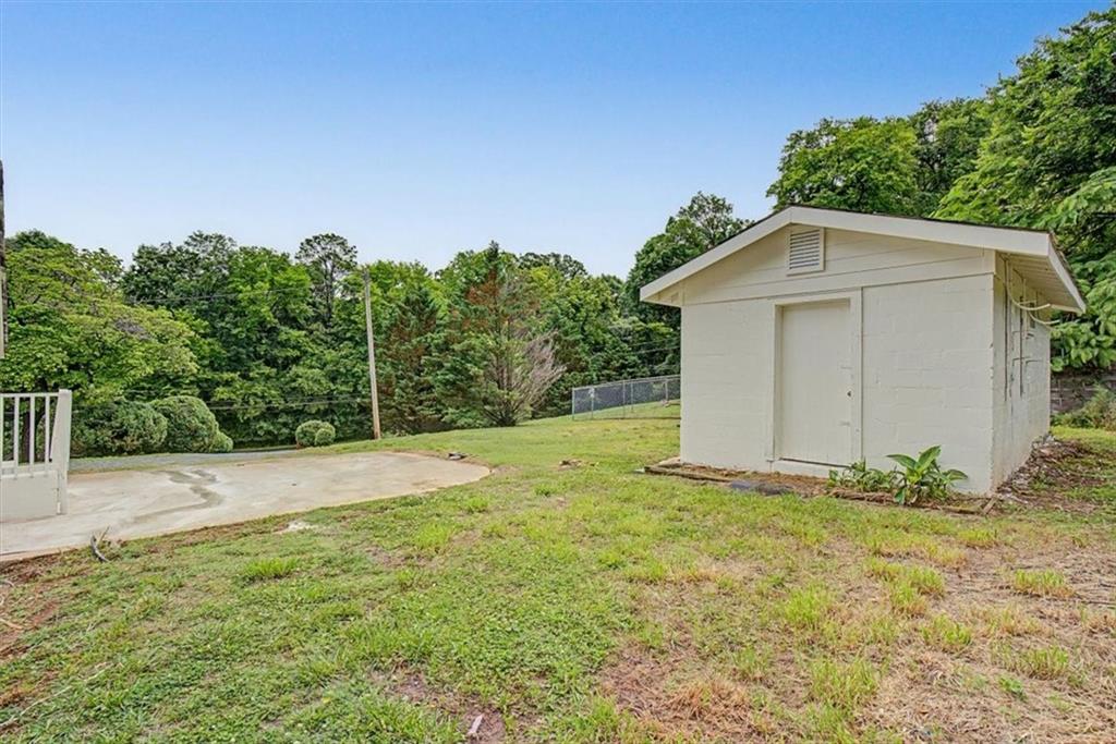 2115 King Road Dalton, GA 30720 - Photo 36 of 54 a view of a house with a yard