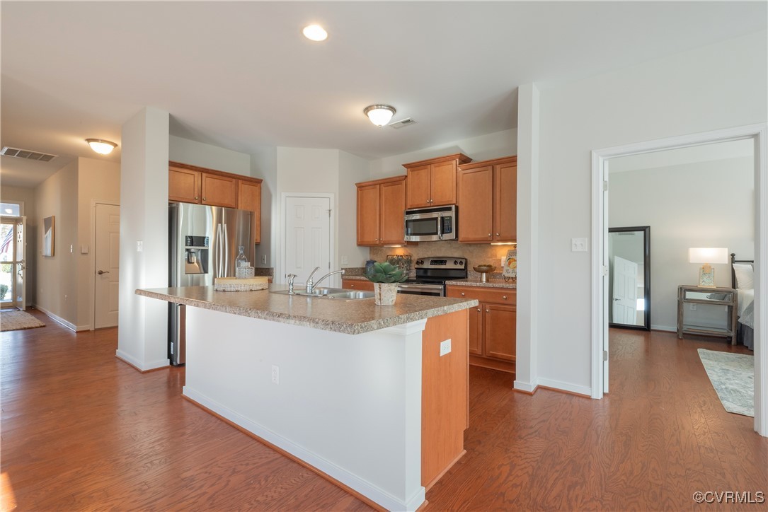 8116 Old Glen Dale Court Mechanicsville, VA 23116 - Photo 13 of 50 Kitchen with hardwood floors, an island, appliance