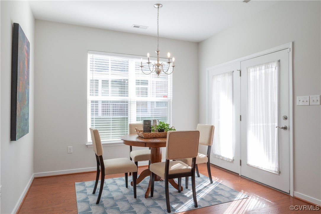 8116 Old Glen Dale Court Mechanicsville, VA 23116 - Photo 18 of 50 Dining Rm with hardwood flooring, a wealth of natu