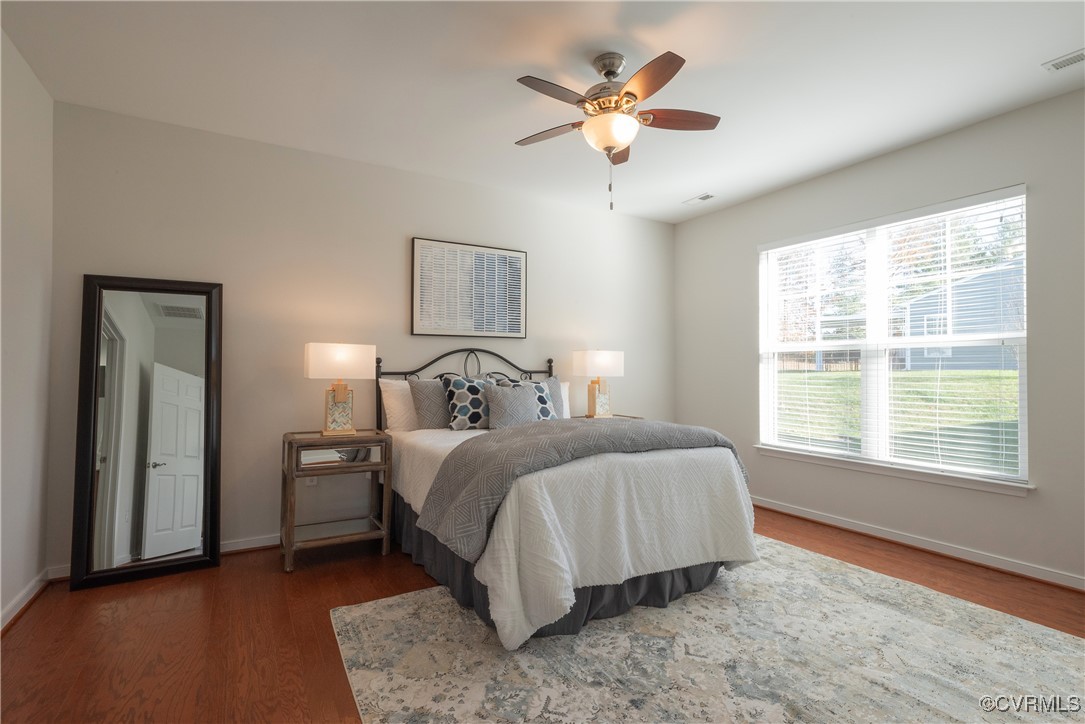 8116 Old Glen Dale Court Mechanicsville, VA 23116 - Photo 20 of 50 Primary Bedroom featuring ceiling fan, hardwood fl