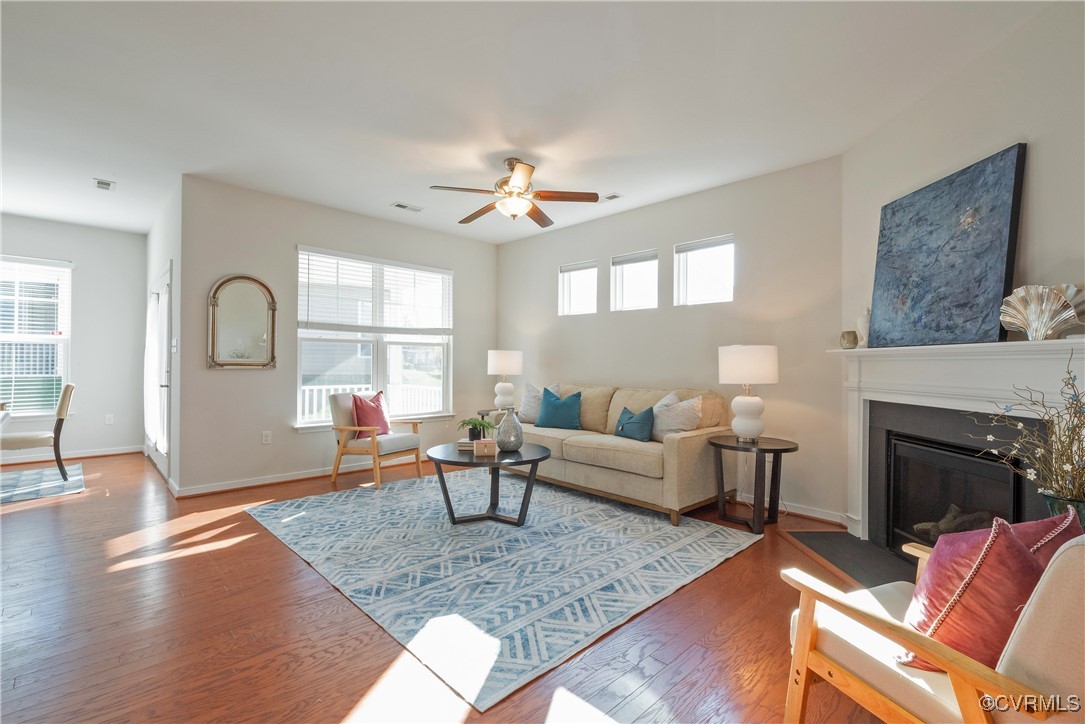 8116 Old Glen Dale Court Mechanicsville, VA 23116 - Photo 8 of 50 Living room lots of natural light, gas FP Open to