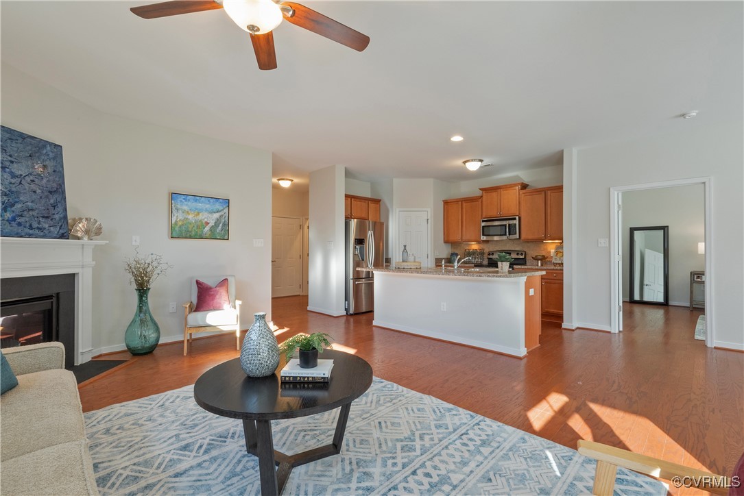 8116 Old Glen Dale Court Mechanicsville, VA 23116 - Photo 10 of 50 Living room with ceiling fan and hardwood flooring