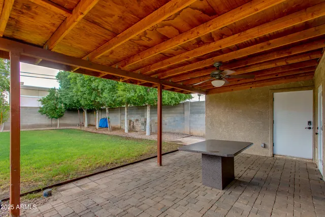a view of a backyard with a slide