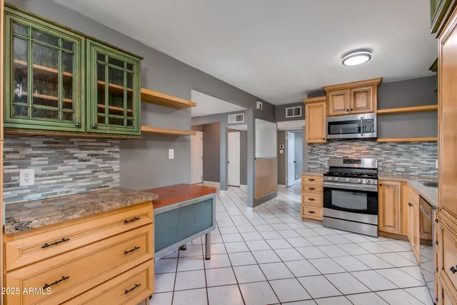 a view of walk in closet with living room