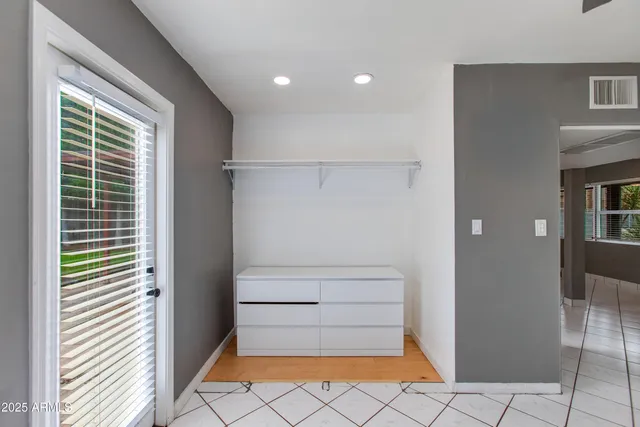 a view of an empty room and window