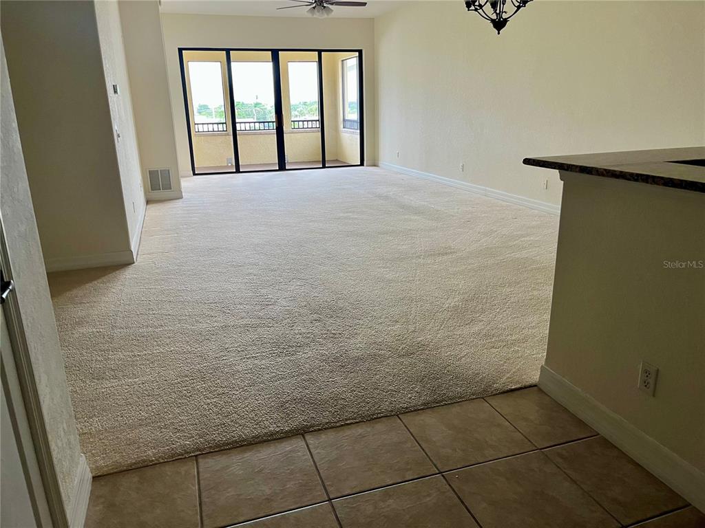 1340 Rock Dove Court, Unit 144 Punta Gorda, FL 33950 - Photo 6 of 7 a view of an empty room with windows