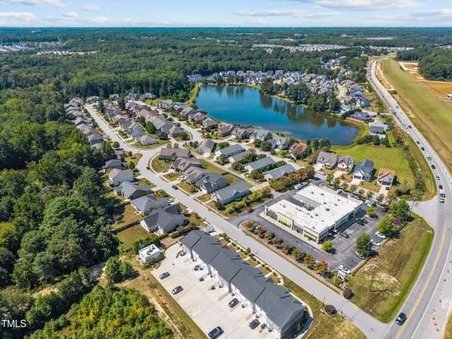a kitchen with granite countertop stainless steel appliances and wooden cabinets