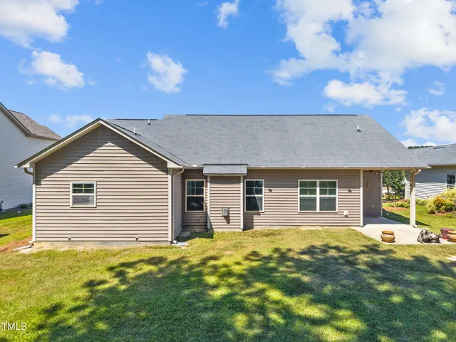a house view with a garden space