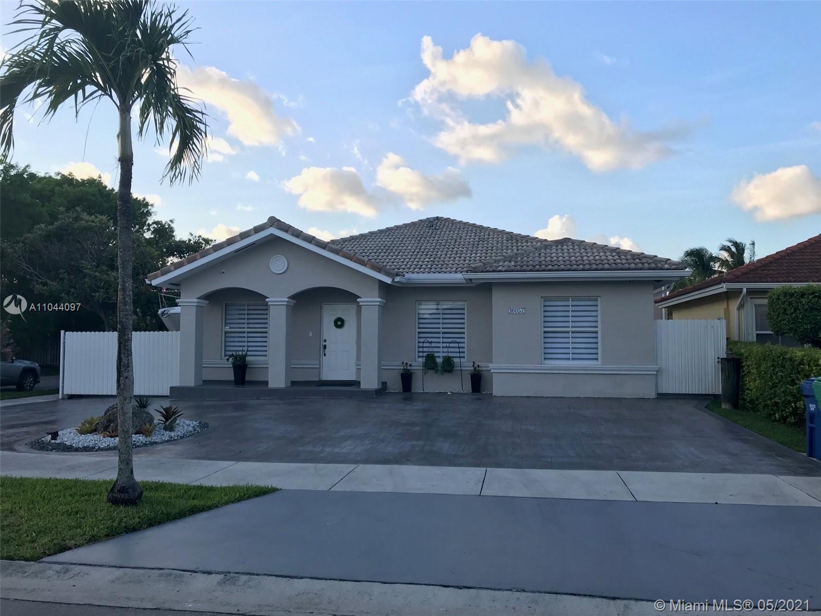16057 Southwest 68th Street Miami, FL 33193 - Photo 4 of 34