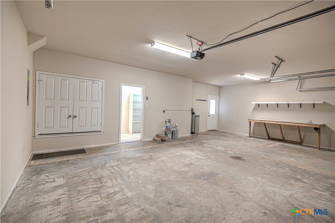 9207 Lake Pointe Drive Temple, TX 76502 - Photo 15 of 42 a view of a livingroom with a staircase