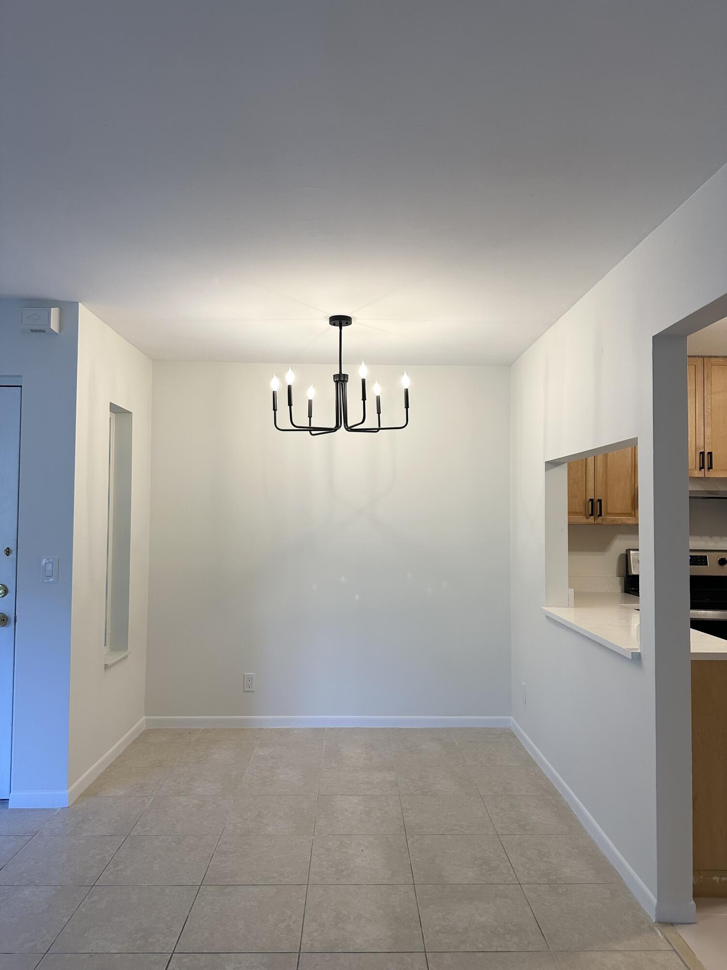 4779 Sable Pine Circle, Unit B2 West Palm Beach, FL 33417 - Photo 12 of 21 a view of an empty room