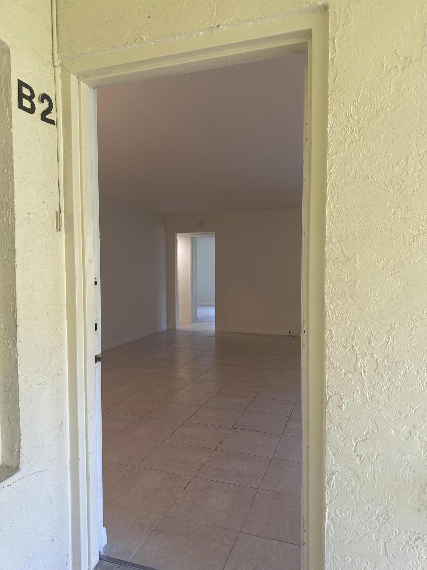 4779 Sable Pine Circle, Unit B2 West Palm Beach, FL 33417 - Photo 3 of 21 a view of a hallway