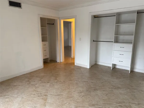wooden floor and cabinet in a room