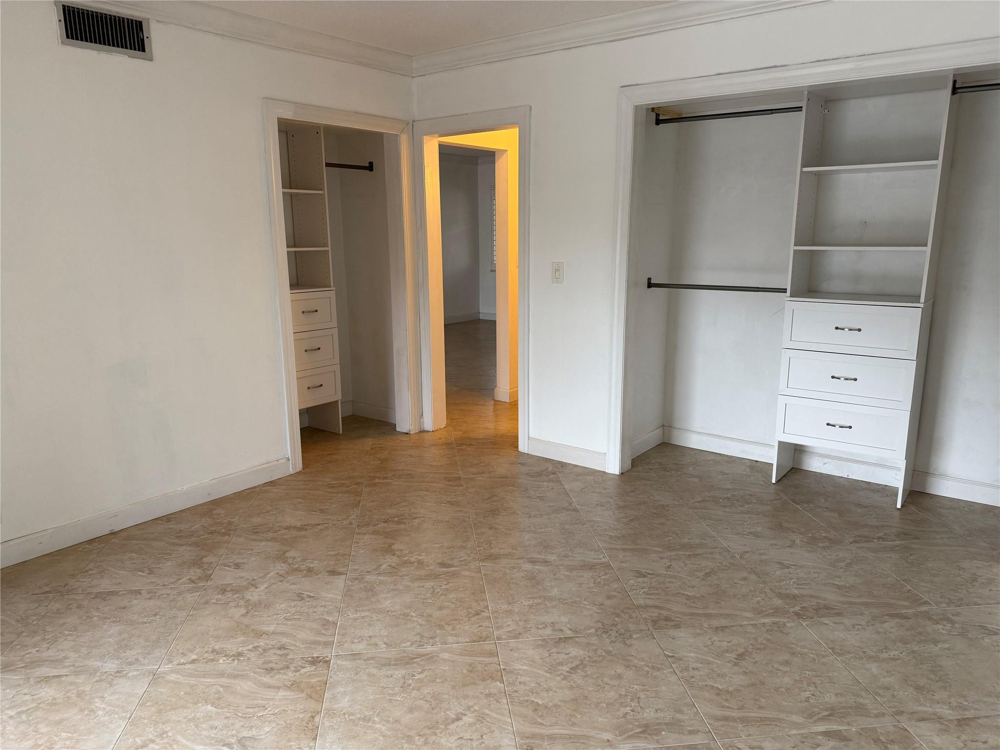 2131 Northeast 42nd Court, Unit 202E Lighthouse Point, FL 33064 - Photo 12 of 24 primary bedroom