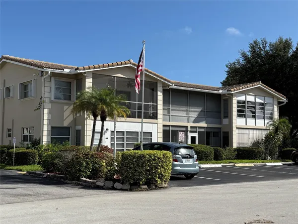 a view of a house with a swimming pool