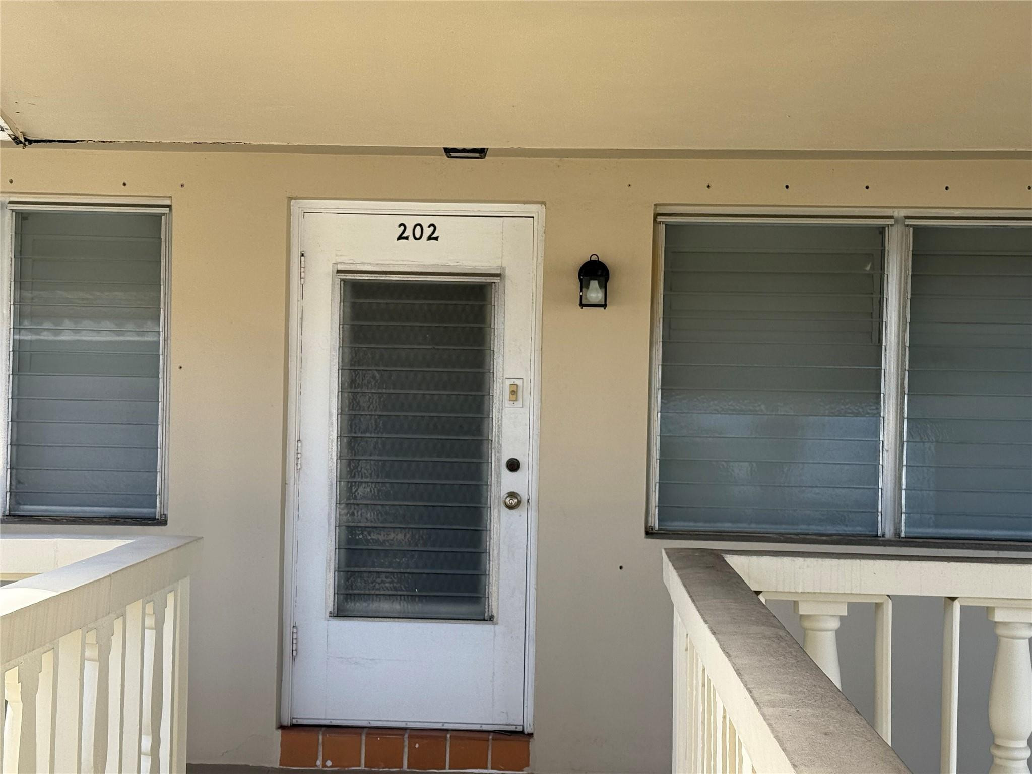 2131 Northeast 42nd Court, Unit 202E Lighthouse Point, FL 33064 - Photo 20 of 24 front door faces north