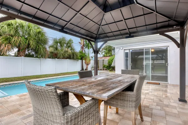 a view of swimming pool with a yard