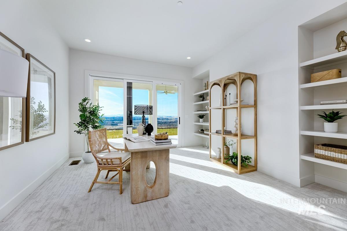 5825 East Prominence Court Boise, ID 83716 - Photo 18 of 45 Office area with light colored carpet, built in shelves, and recessed lighting