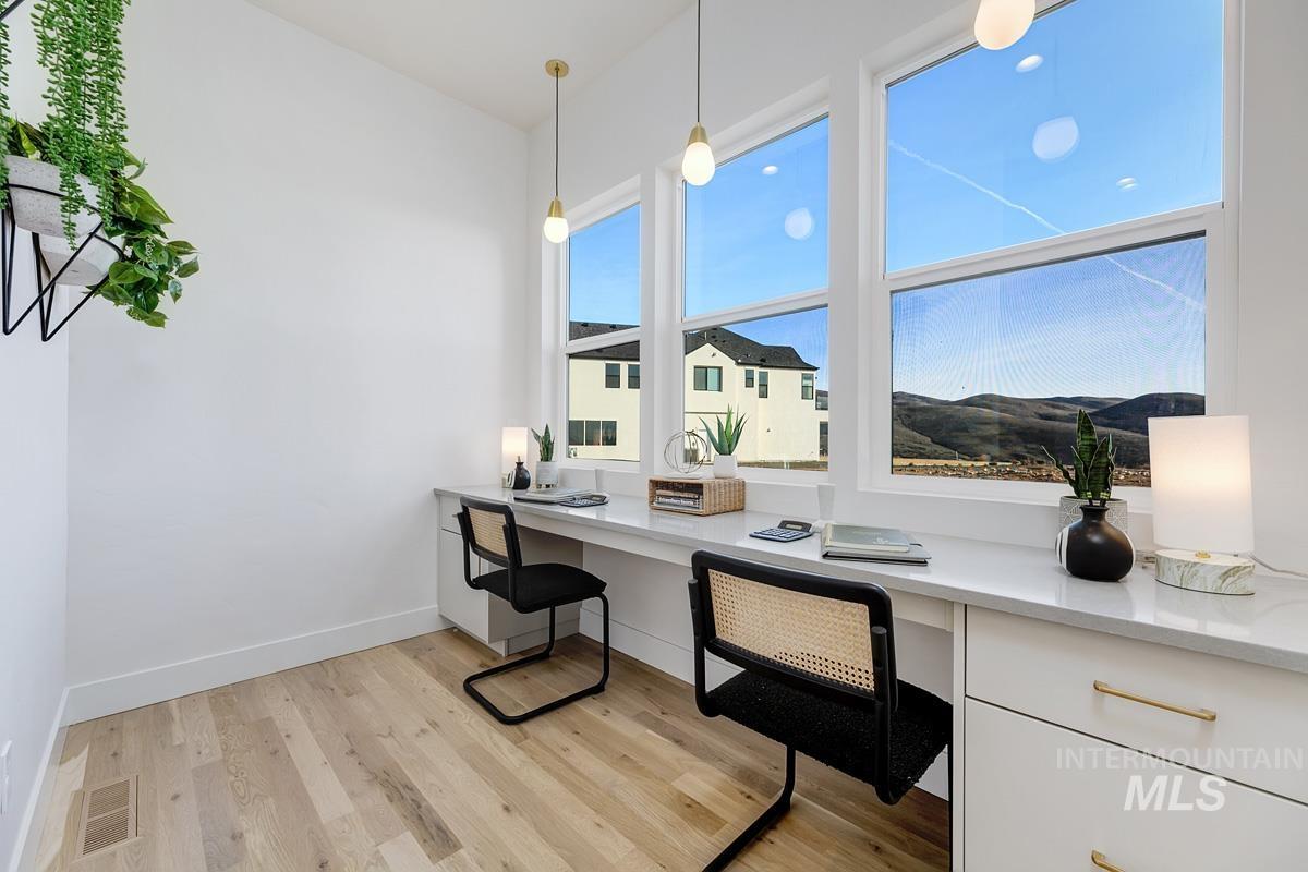5825 East Prominence Court Boise, ID 83716 - Photo 20 of 45 Office area with built in desk and light wood-type flooring