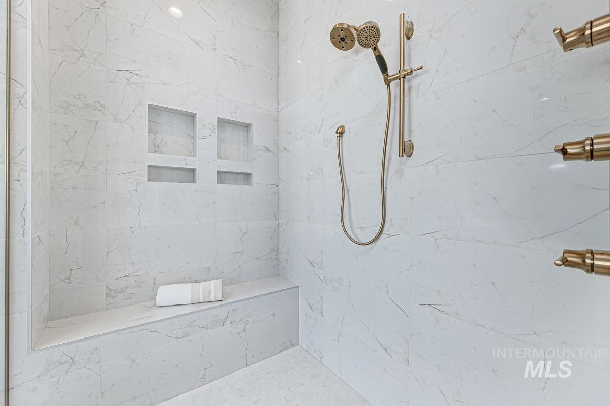 5825 East Prominence Court Boise, ID 83716 - Photo 29 of 45 Full bathroom featuring a marble finish shower