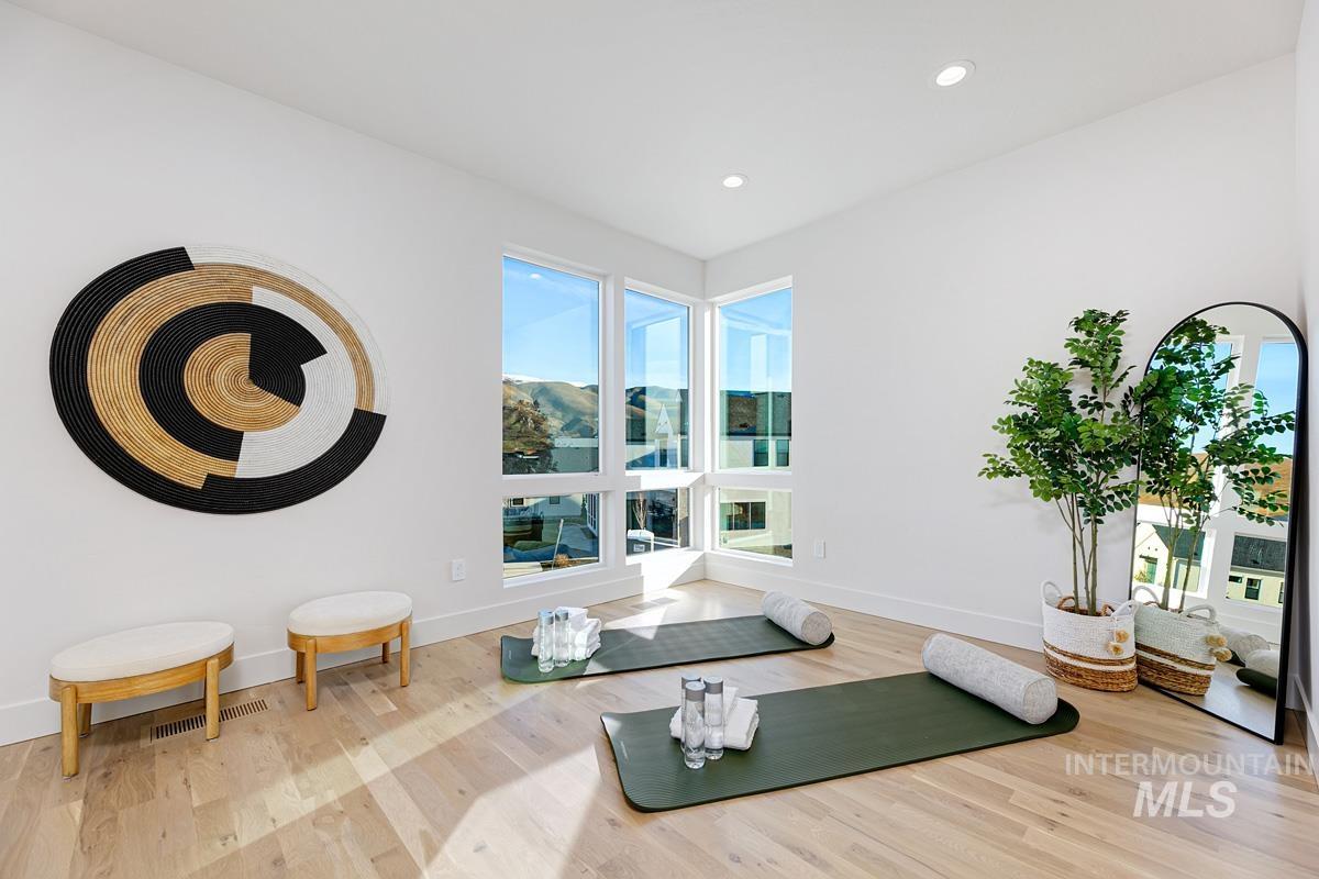 5825 East Prominence Court Boise, ID 83716 - Photo 32 of 45 Workout room with light wood-style floors and recessed lighting