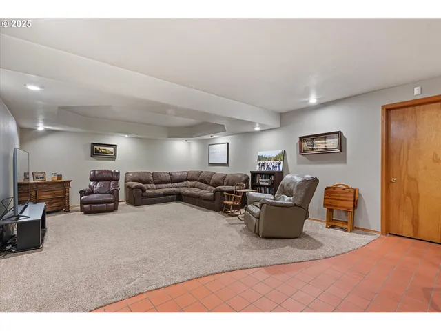 a living room with furniture and a couch