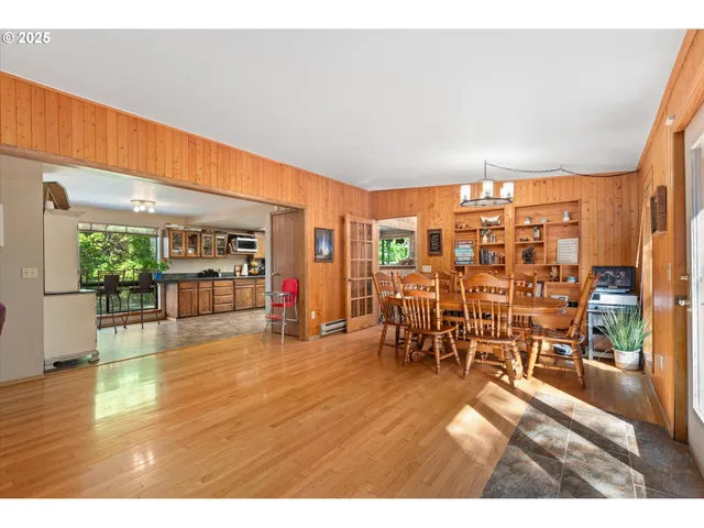 a living room view with furniture and wooden floor