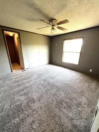 a view of a livingroom with a window