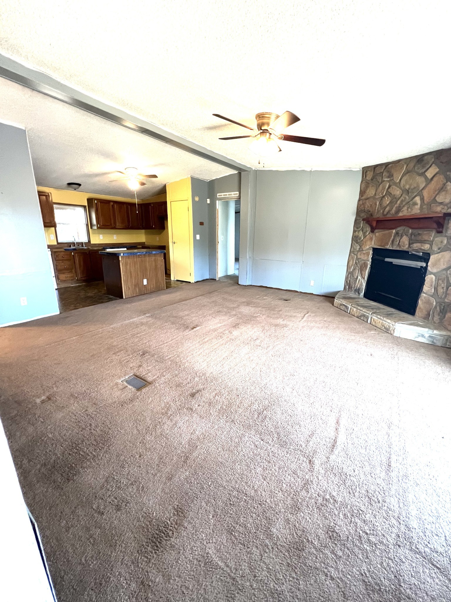 416 Walker Ridge Road Big Rock, TN 37023 - Photo 8 of 25 a view of an empty room with a fireplace