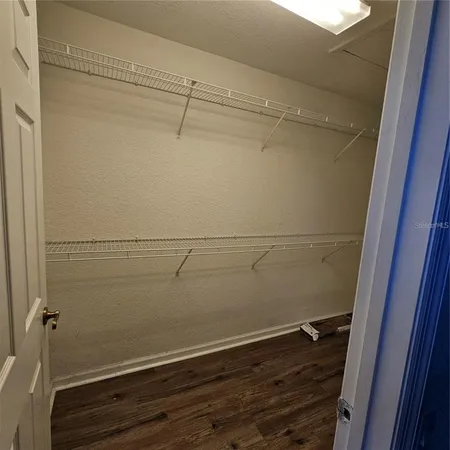 a view of a room with racks on the wall