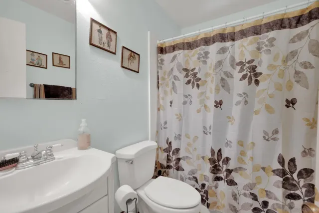 a view of sitting area with furniture and wooden floor