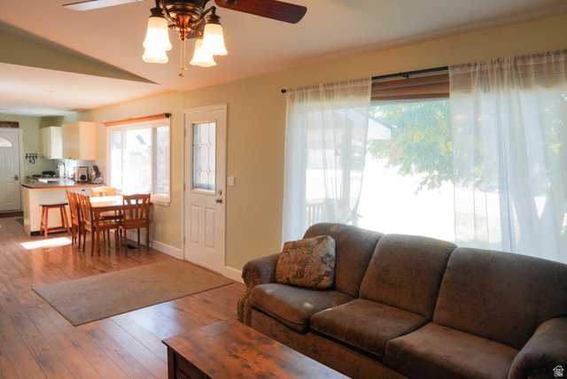 324 Stringtown Road Georgetown, ID 83239 - Photo 8 of 49 Living room featuring hardwood / wood-style floors and ceiling fan