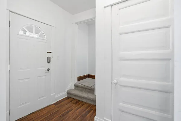 a hallway with wooden floor