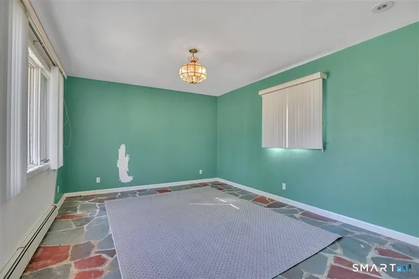 a view of a room with a window