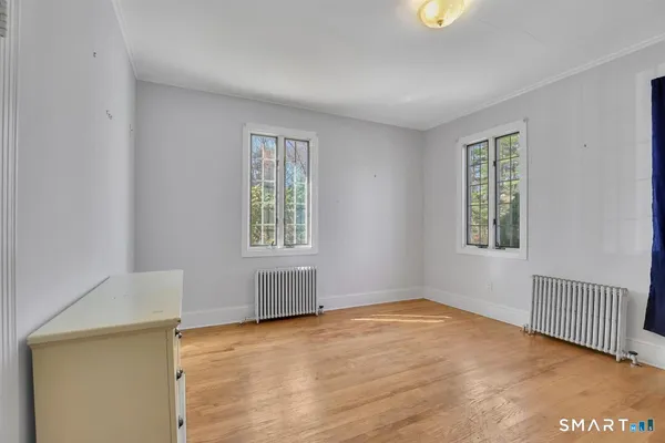 an empty room with windows