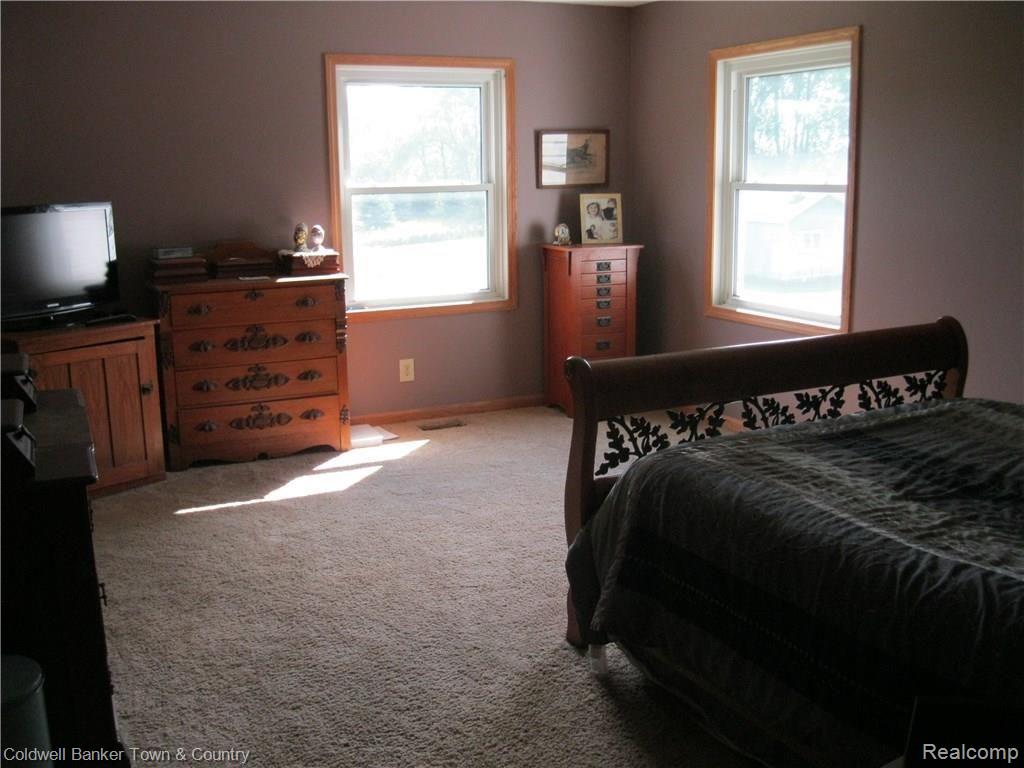 9024 North Robb Road Fowlerville, MI 48836 - Photo 10 of 21 Master Bedroom