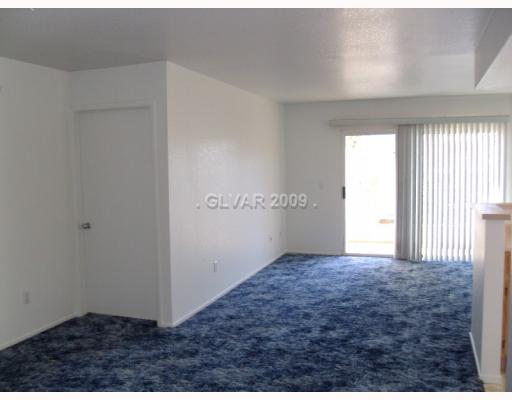 8070 West Russell Road, Unit 2102 Las Vegas, NV 89113 - Photo 3 of 12 Living Room.