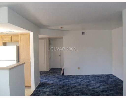 8070 West Russell Road, Unit 2102 Las Vegas, NV 89113 - Photo 5 of 12 Living Room.
