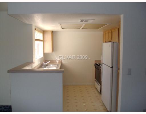 8070 West Russell Road, Unit 2102 Las Vegas, NV 89113 - Photo 6 of 12 Kitchen.