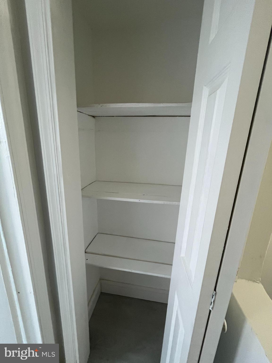 2720 North Hemberger Street Philadelphia, PA 19132 - Photo 15 of 21 a view of walk in closet with empty racks