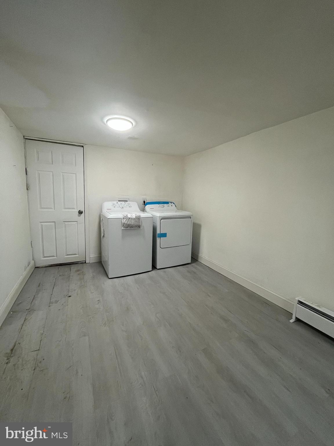 2720 North Hemberger Street Philadelphia, PA 19132 - Photo 19 of 21 a view of a storage & utility room with washer and dryer
