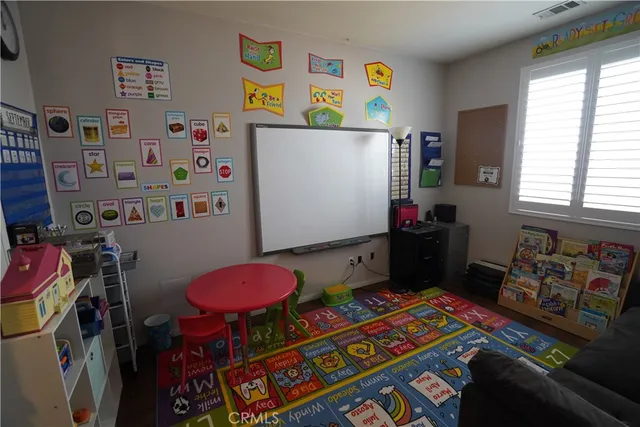 a room with furniture and a window