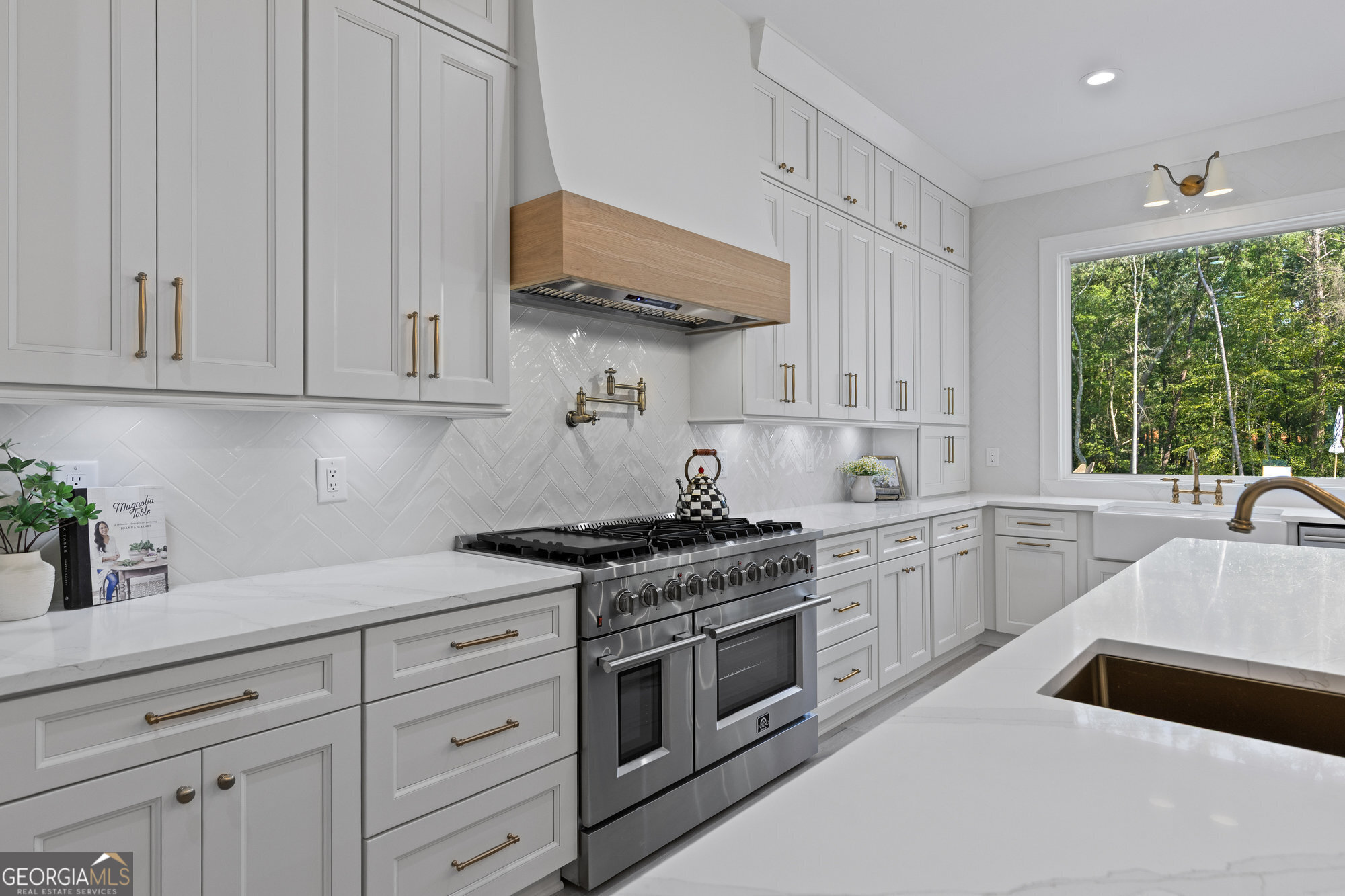 2 Jack Pittman Road Monroe, GA 30019 - Photo 11 of 80 a kitchen with stainless steel appliances granite countertop white cabinets a sink and a stove
