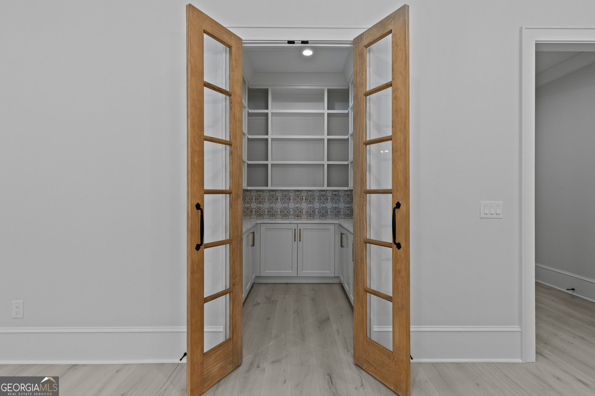 2 Jack Pittman Road Monroe, GA 30019 - Photo 34 of 80 a view of walk in closet with empty racks