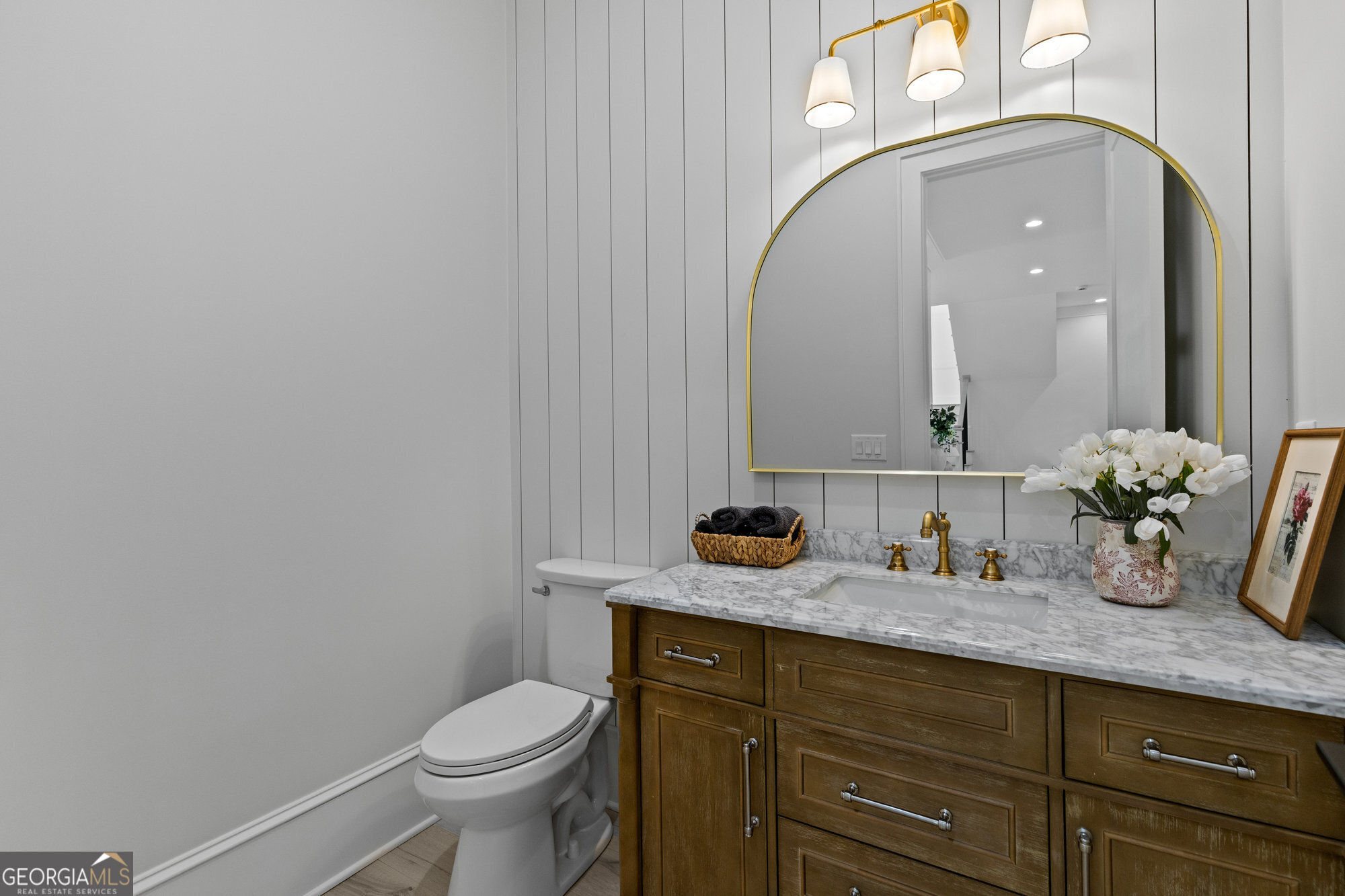 2 Jack Pittman Road Monroe, GA 30019 - Photo 65 of 80 a bathroom with a granite countertop toilet sink and mirror