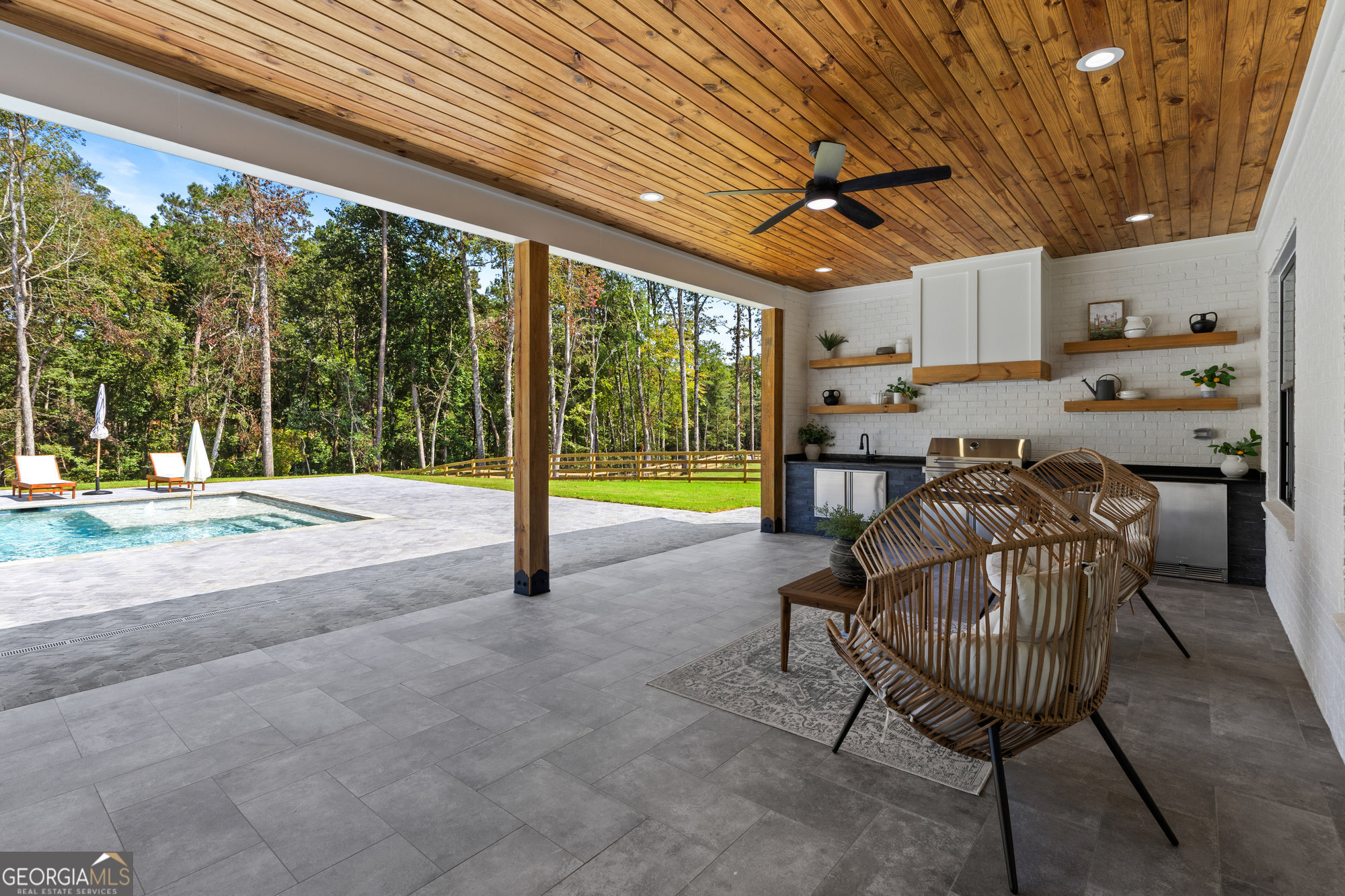 2 Jack Pittman Road Monroe, GA 30019 - Photo 73 of 80 a view of a porch with furniture and a backyard
