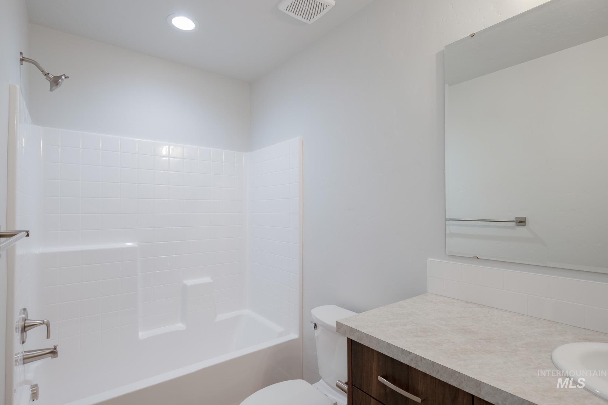 1494 Long Pond Street Middleton, ID 83644 - Photo 22 of 25 Bathroom featuring shower / washtub combination, vanity, and recessed lighting