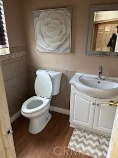 a bathroom with a toilet and a sink