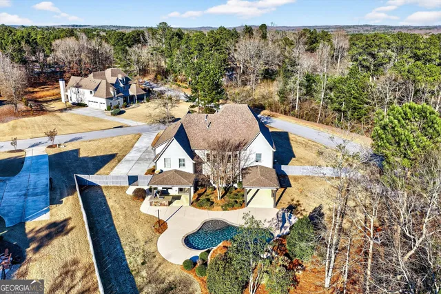 a view of livingroom with hardwood floor and a ceiling fan